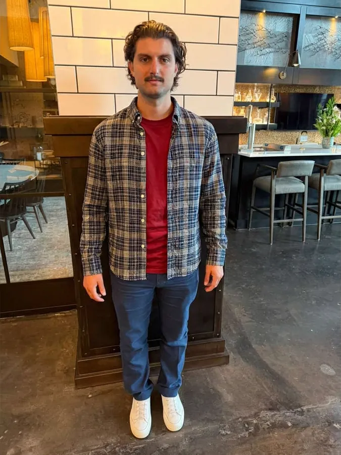 Virtual try-on of a navy check linen cotton shirt on a second person